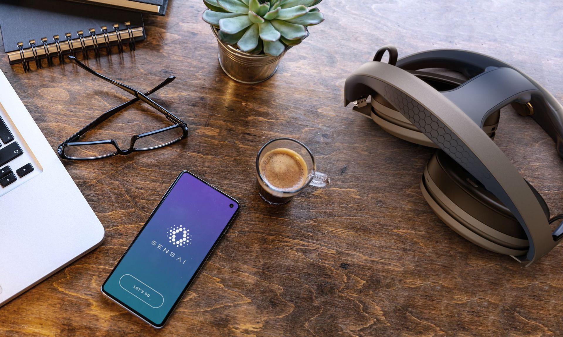 Sens.ai neurotech headset on a desk, ready to start a brain training session